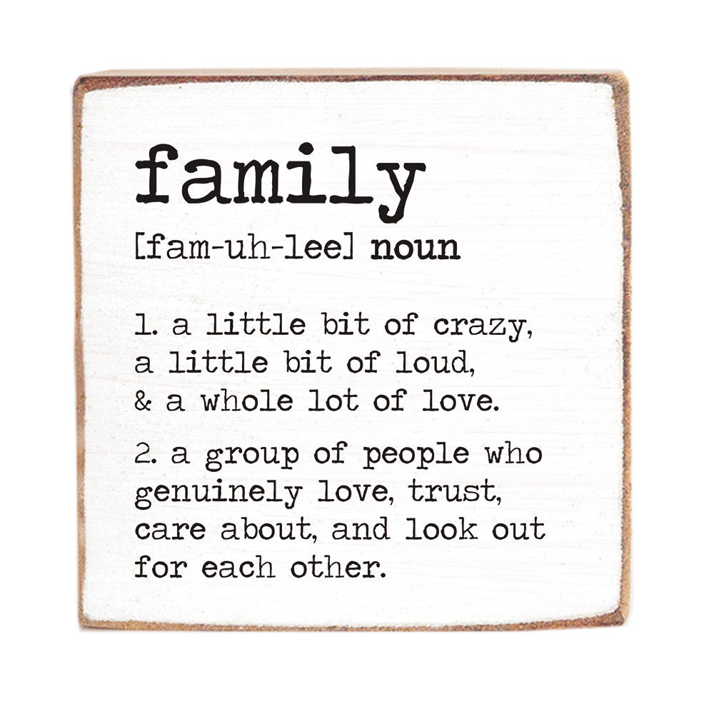 Definition of 'family' on a rustic marlin wooden block with black text. Available at Be Charmed