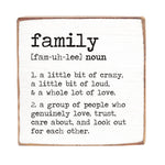 Definition of 'family' on a rustic marlin wooden block with black text. Available at Be Charmed