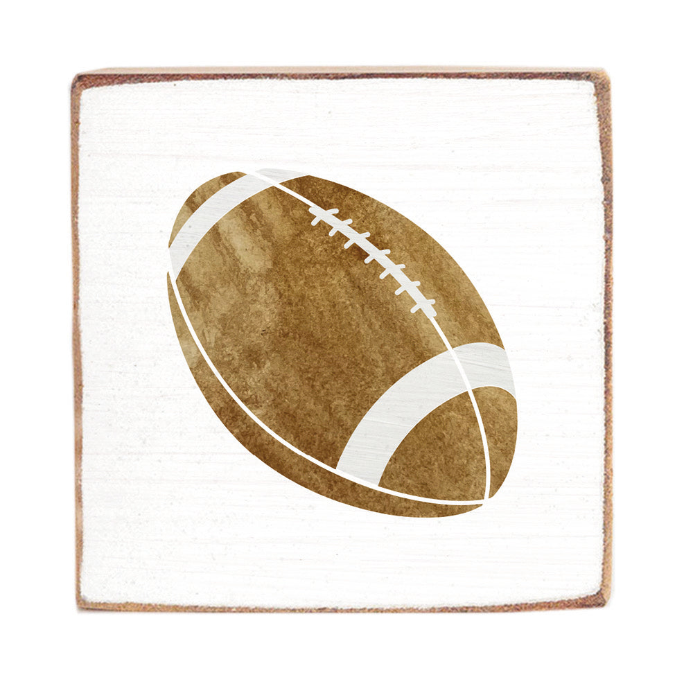 Rustic wood block with a football design on a white background. Available at Be Charmed