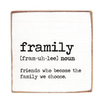 A decorative wooden block with the definition of 'framily' printed on it, indicating it's a noun and friends who become the family we choose. Available at Be Charmed