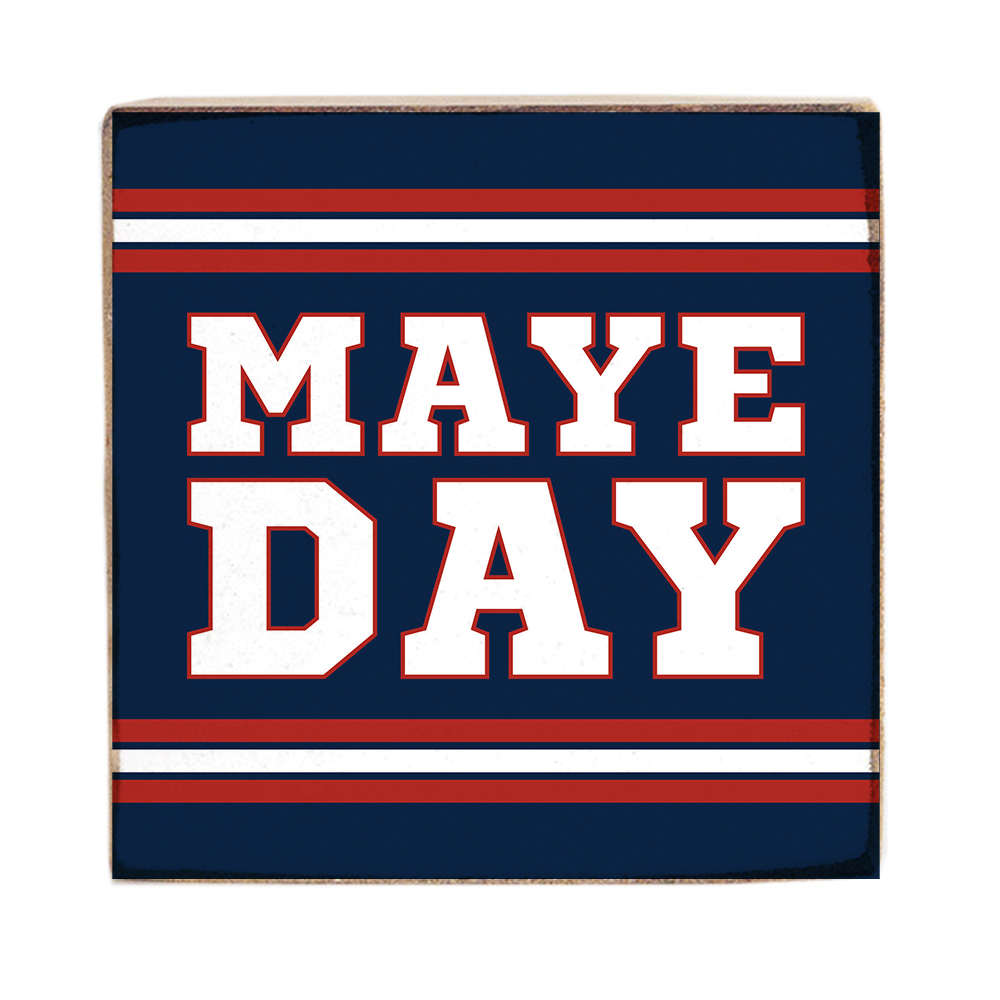 Square sign with 'MAYE DAY' text on a blue background with red and white stripes. Available at Be Charmed