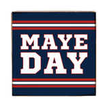 Square sign with 'MAYE DAY' text on a blue background with red and white stripes. Available at Be Charmed