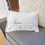 Rustic Marlin Home Sweet Home 12x18 Pillow pictured on chair- Handcrafted in New England, this pillow adds rustic charm to any space. Available at Be Charmed 