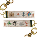 Keychain with fabric strap featuring Boston-themed icons on a white background. Available at Be Charmd