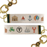 Keychain with fabric strap featuring Boston-themed icons on a white background. Available at Be Charmd
