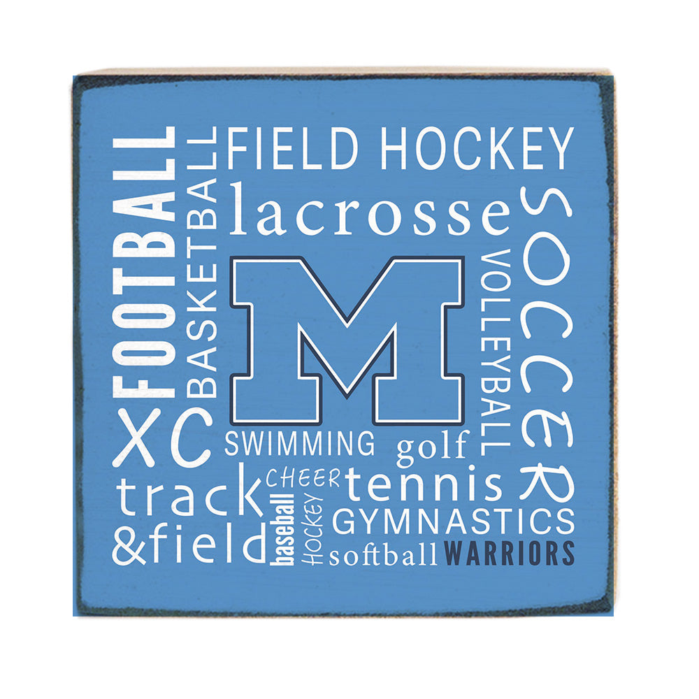 A Rustic Marlin wooden block sign with blue background and white text listing various sports, including field hockey, lacrosse, soccer, and more, along with the text 'FIELD HOCKEY lacrosse SOCCER' and 'SWIMMING golf Volleyball'. Available at Be Charmed