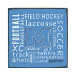 A Rustic Marlin wooden block sign with blue background and white text listing various sports, including field hockey, lacrosse, soccer, and more, along with the text 'FIELD HOCKEY lacrosse SOCCER' and 'SWIMMING golf Volleyball'. Available at Be Charmed