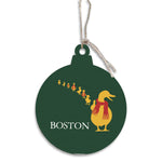 Decorative ornament with a duck and ducklings design on a green background. Available at Be Charmed