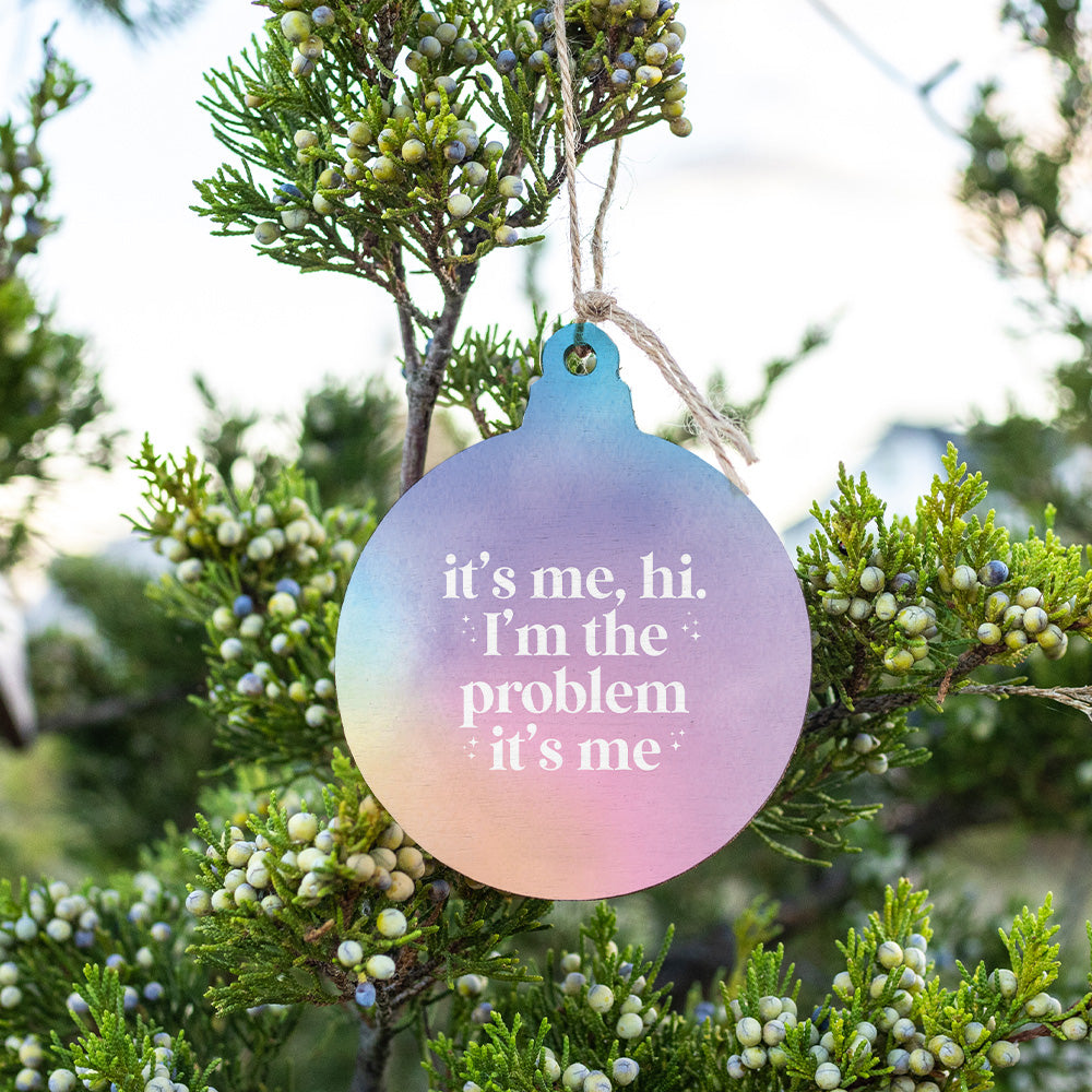 Rustic marlin ornament with “It's Me, Hi I'm The Problem,” funny holiday decor and gift idea. Available at Be Charmed