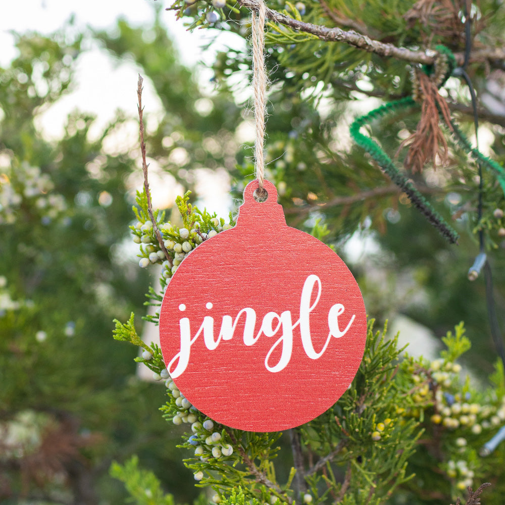 Rustic Marlin Ornament featuring “Jingle.” Perfect Christmas décor or festive gift. Available at Be Charmed