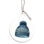 Decorative Rustic Marllin ornament with a blue beanie and 'Medfield' text on a white background. Available at Be Charmed