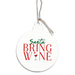 Round white ornament with 'Santa Bring Wine' text and a wine glass icon on a white background. Available at Be Charmed