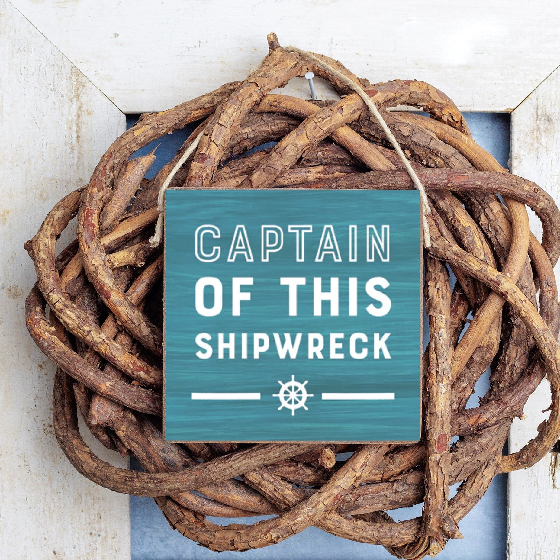 Rustic marlin square twine sign with “Captain of the Shipwreck,” decorative nautical home accent and gift. Available at Be Charmed