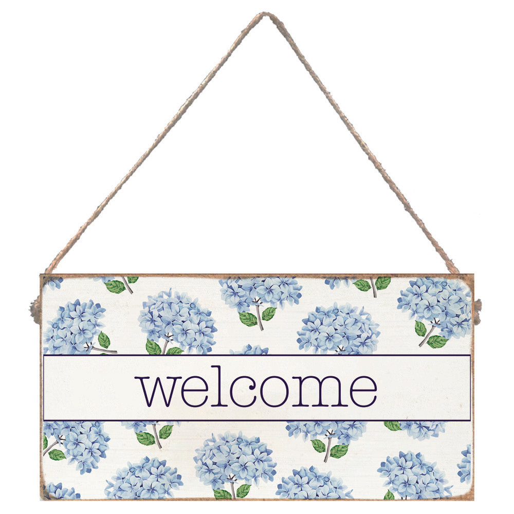 Rustic Marlin Welcome Hydrangea Twine Sign featuring blue hydrangea illustrations and 'Welcome' text, perfect for coastal home décor. Available at Be Charmed.