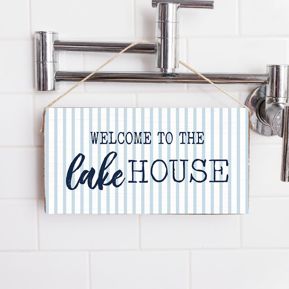 Rustic Marlin “Welcome to the Lake House” wooden twine sign with coastal design, available at Be Charmed.
