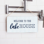 Rustic Marlin “Welcome to the Lake House” wooden twine sign with coastal design, available at Be Charmed.