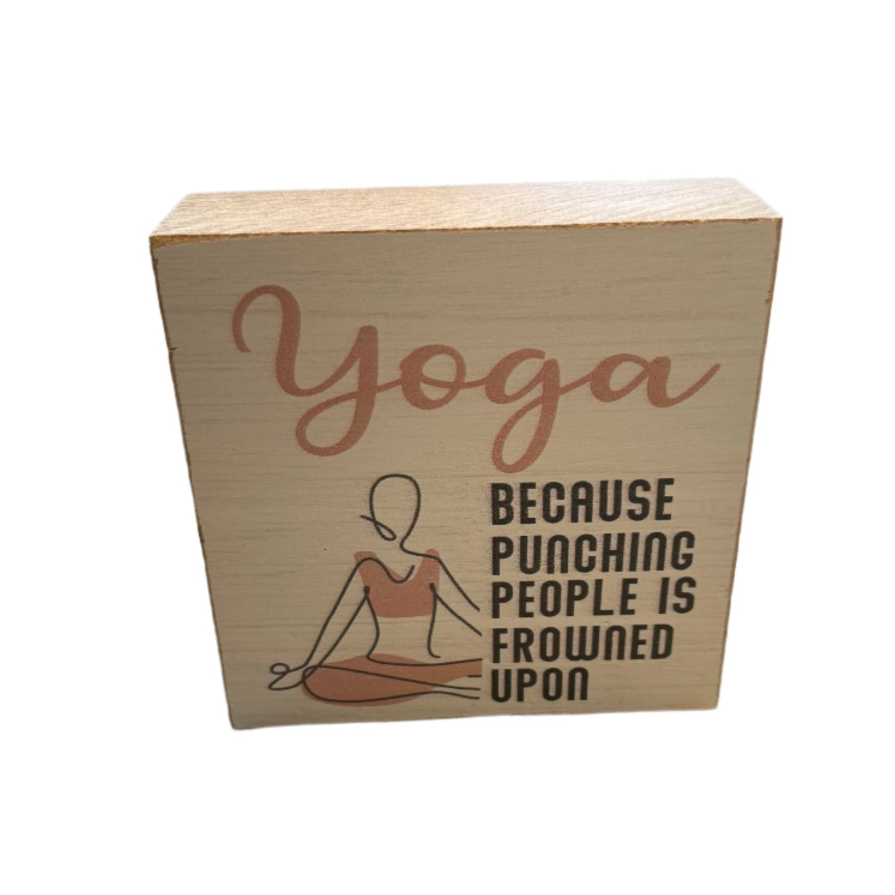 A decorative wooden block with 'Yoga Because Punching People is Frowned Upon' printed on it, featuring a simple illustration of a person in a yoga pose. Available at Be charmed