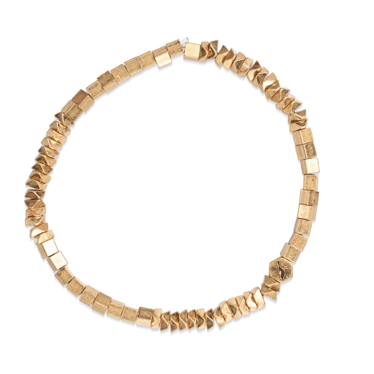 Gold beaded bracelet on a white background. Available at Be Charmed