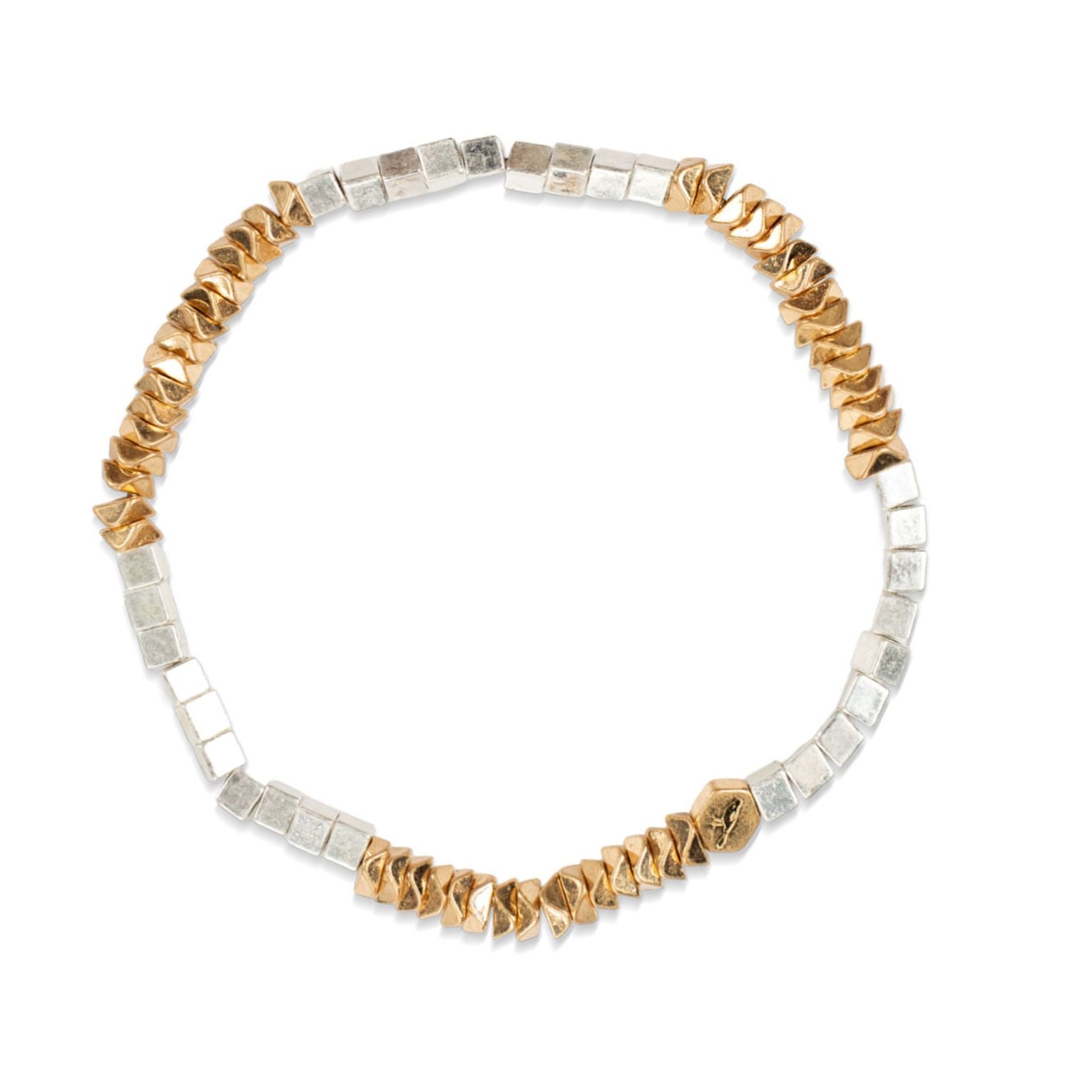 Bracelet with gold and silver beads on a white background. Available at Be Charmed