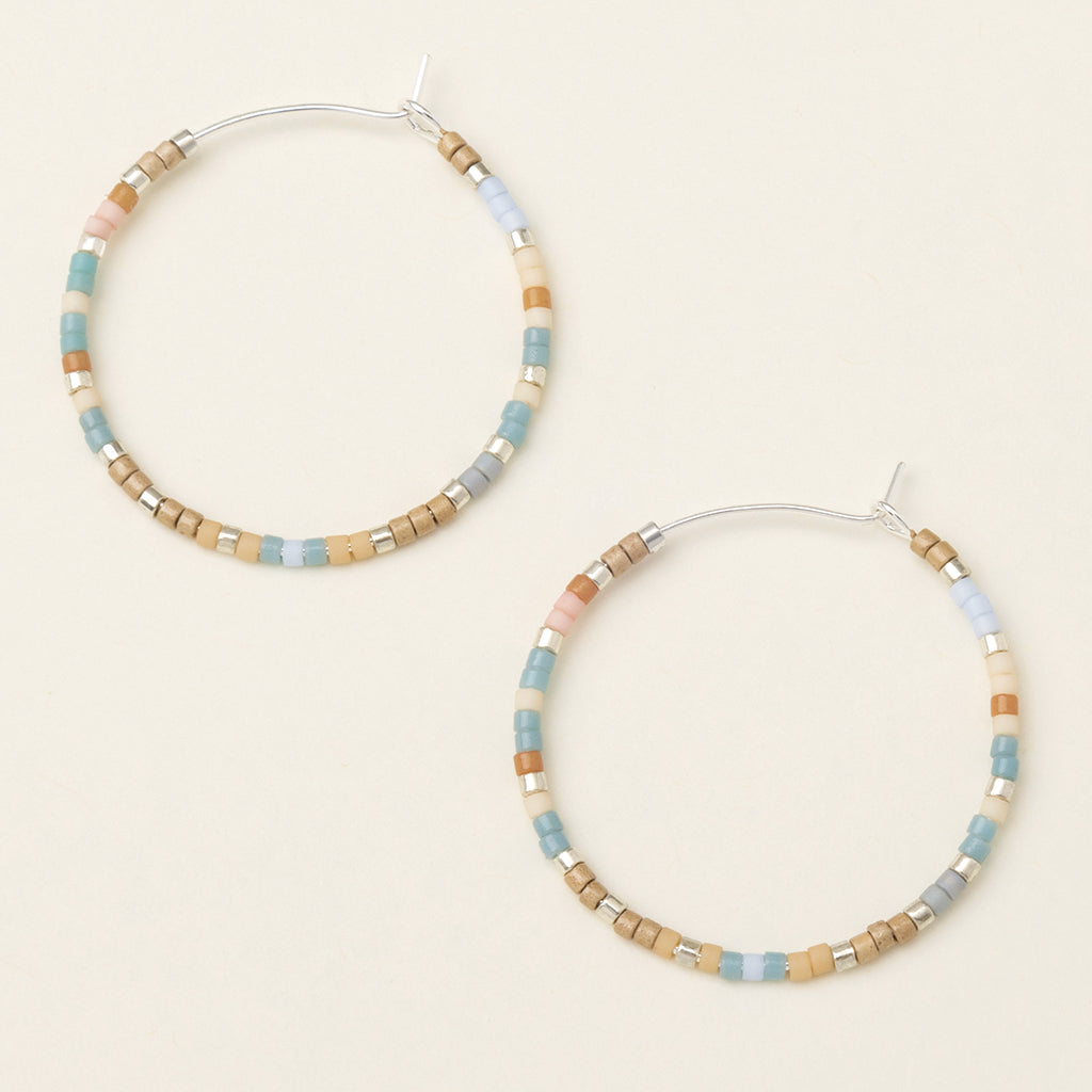 Chromacolor Miyuki Small Hoop Earrings in Desert Blue Multi/Silver by Scout Curated Wears. Colorful glass beads, lightweight, and elegant. Available at Be Charmed.