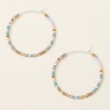 Chromacolor Miyuki Small Hoop Earrings in Desert Blue Multi/Silver by Scout Curated Wears. Colorful glass beads, lightweight, and elegant. Available at Be Charmed.