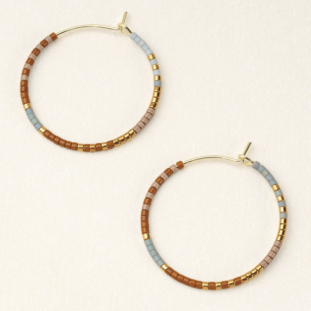 Chromacolor Miyuki Small Hoop Earrings in Desert Multi/Gold by Scout Curated Wears. Hand-beaded, lightweight, and stylish. Available at Be Charmed.