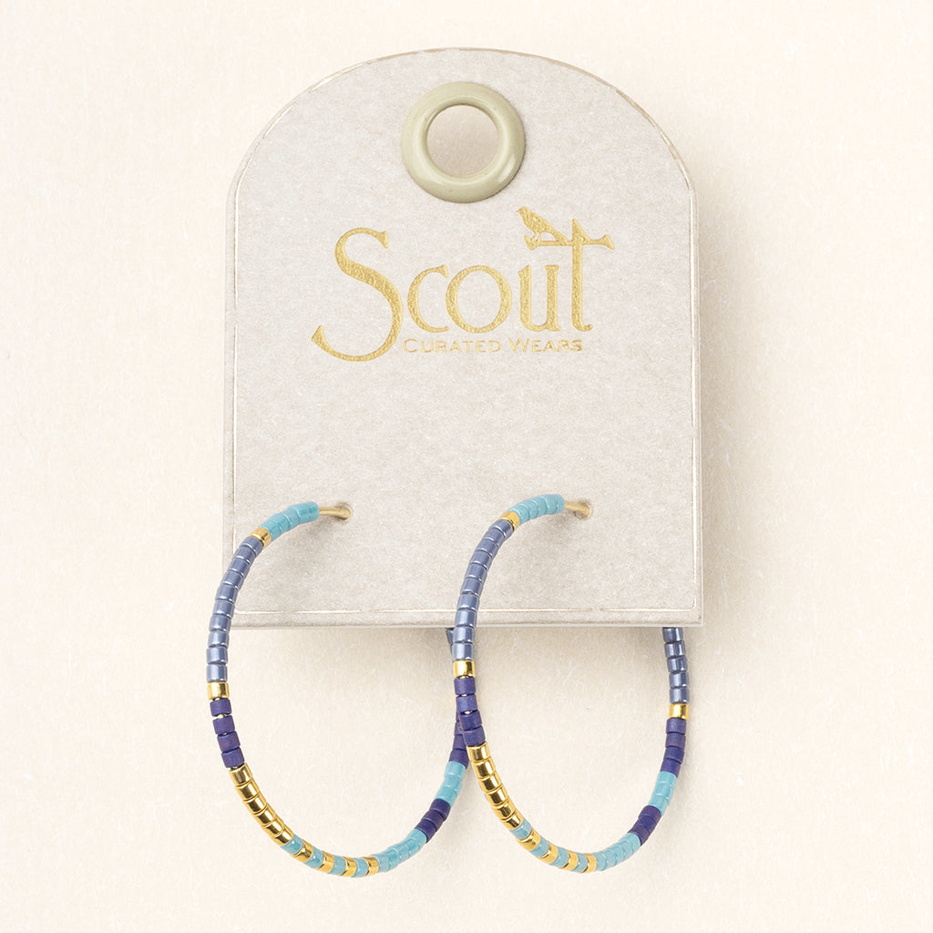 Chromacolor Miyuki Small Hoop Cobalt Multi/Gold. A pair of cobalt blue and gold colored hoop earrings displayed on a card with 'Scout Curated Wears' branding.