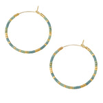 Scout Curated Wears Earrings Chromacolor Miyuki Small Hoop Turquoise Mint/Gold; A pair of gold-colored hoop earrings with turquoise mint beads mixed in, displayed against a white background. Available at Be Charmed