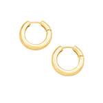 Gold hoop earrings on a white background. Available at Be Charmed.