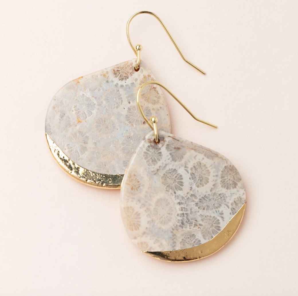 Scout Curated Wears Earrings Stone Dipped Teardrop Fossil Coral/Gold; A pair of round teardrop earrings with a stone pattern in white and gold colors, attached to small gold-dipped wires. Available at Be Charmed