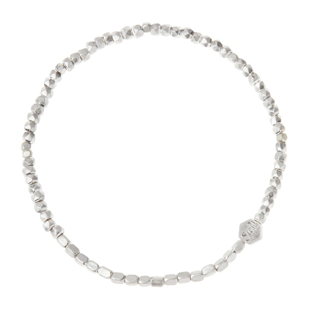 Mini Metal Stacking Bracelet in Silver by Scout Curated Wears. Sleek, minimalist, and perfect for layering. Lightweight and elegant. Available at Be Charmed.