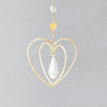 Mini Heart Suncatcher by Scout Curated Wears. A radiant symbol of love and warmth, perfect for gifting or window charm. Available at Be Charmed.