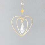 Mini Heart Suncatcher by Scout Curated Wears. A radiant symbol of love and warmth, perfect for gifting or window charm. Available at Be Charmed.