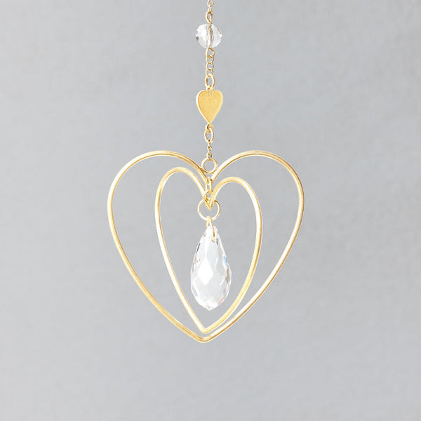 Mini Heart Suncatcher by Scout Curated Wears. A radiant symbol of love and warmth, perfect for gifting or window charm. Available at Be Charmed.