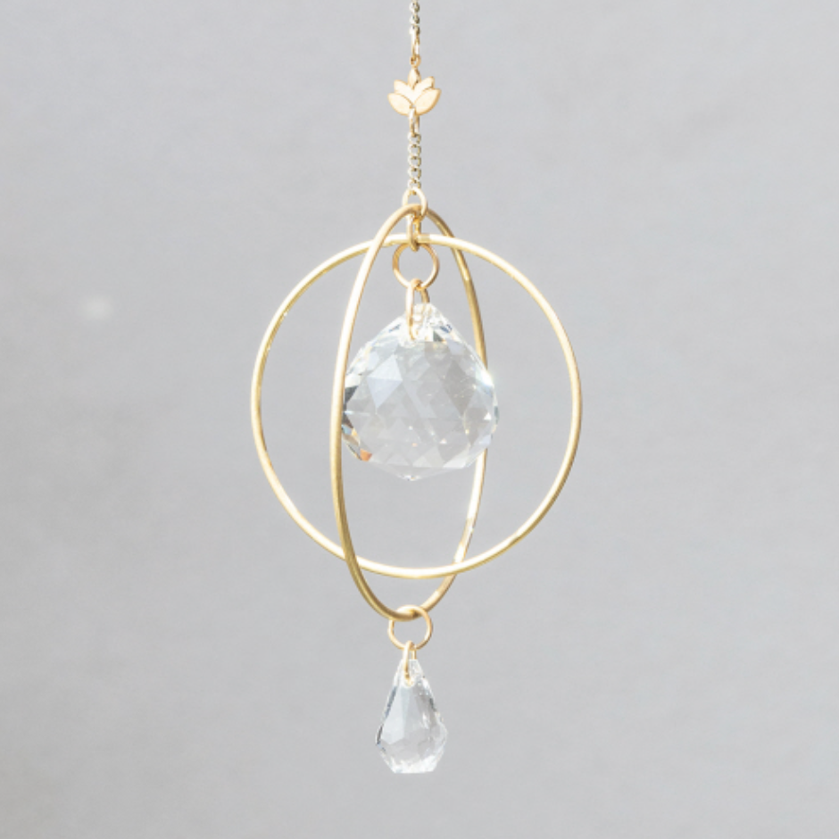 Mini Lotus Suncatcher by Scout Curated Wears, symbolizing strength and personal growth. Compact size, radiant reflections. Available at Be Charmed.