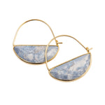 Gold hoop earrings with blue and white stone half-circle pendants on a white background. Available at Be Charmed