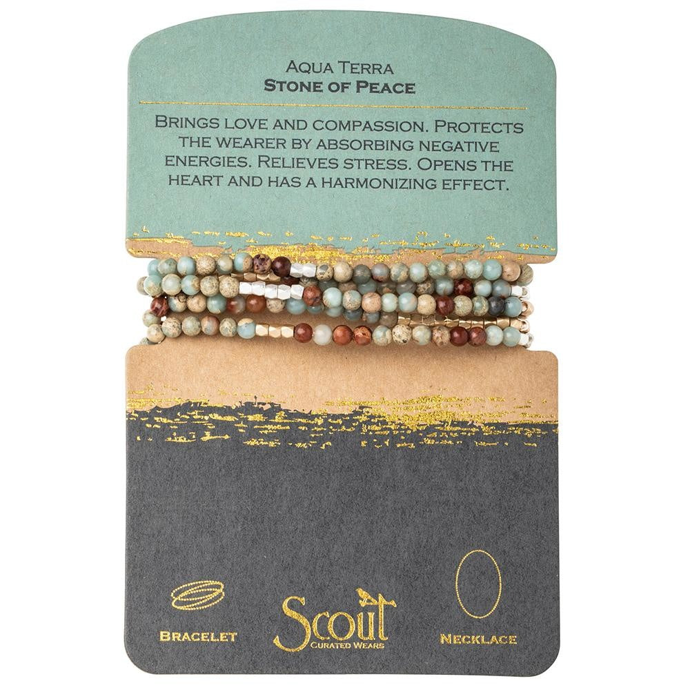 Displayed on a card Stone Wrap Bracelet/Necklace in Aqua Terra by Scout Curated Wears. Promotes peace and serenity. Versatile, calming design. Available at Be Charmed.