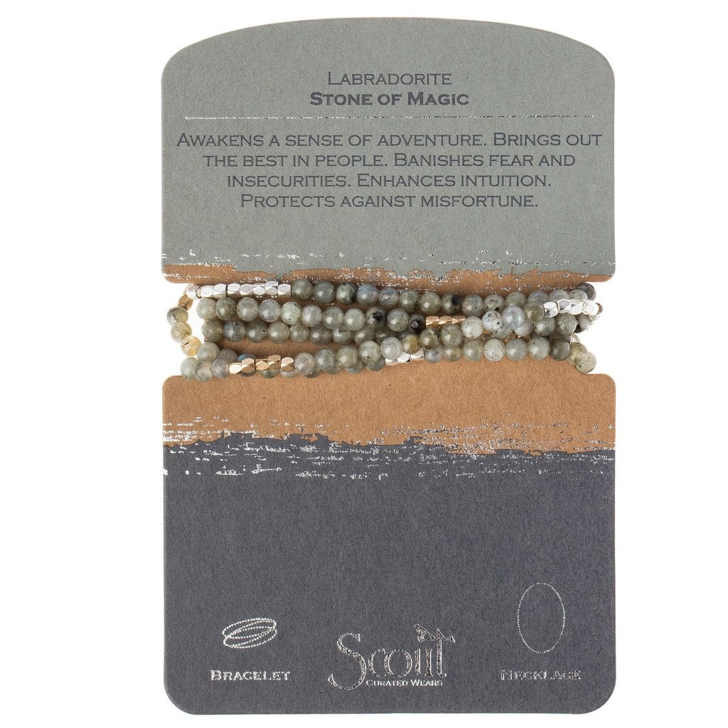 Displayed on card Stone Wrap Bracelet/Necklace in Labradorite by Scout Curated Wears. Labradorite promotes magic, intuition, and transformation. Available at Be Charmed.