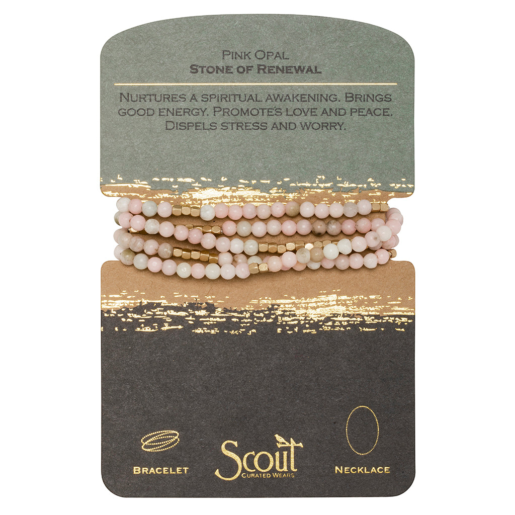 Displayed on card Stone Wrap Bracelet/Necklace in Pink Opal by Scout Curated Wears. Pink Opal promotes renewal and healing. Versatile and elegant. Available at Be Charmed.