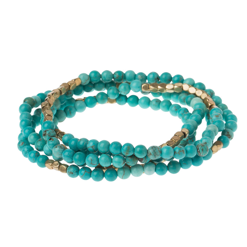 Turquoise/Gold Stone of the Sky Scout Curated Wears Stone Wrap – versatile beaded strand worn as wrap bracelet or necklace with natural stones, available at Be Charmed.