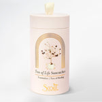 Cylindrical product packaging with 'Tree of Life Suncatcher' design on a white background. Available at Be Charmed