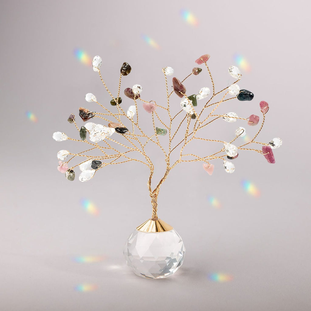 Scout Curated Wears Tree of Life suncatcher featuring Tourmaline stones for courage with gold accents, perfect for home décor or gifting. Available at Be Charmed