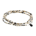 Teardrop Stone Wrap in Dalmatian Jasper, Obsidian & Silver by Scout Curated Wears. Inspires joy and grounding. Versatile design. Available at Be Charmed.