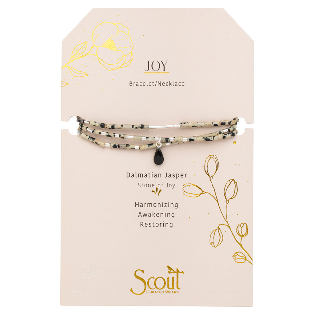 Displayed on card Teardrop Stone Wrap in Dalmatian Jasper, Obsidian & Silver by Scout Curated Wears. Inspires joy and grounding. Versatile design. Available at Be Charmed.
