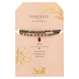 Displayed on Card Teardrop Stone Wrap in Pyrite, Fuchsia & Gold by Scout Curated Wears. Adds sparkle and vibrant energy. Wear as necklace or bracelet. Available at Be Charmed.