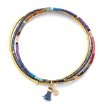 Mixed dark beaded bracelet with gold accents on a white background. Available at Be Charmed