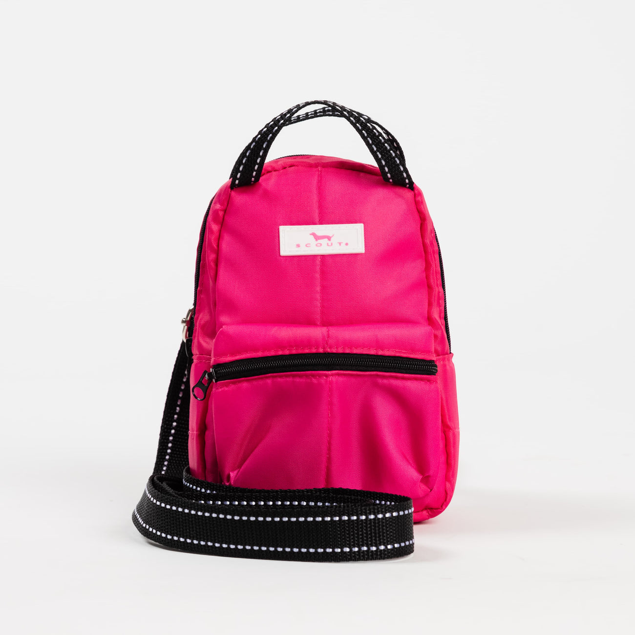 Pink Puffer SCOUT Globetrotter Backpack – lightweight, water-resistant daypack with padded adjustable straps, interior organization pockets and water bottle sleeve. Available at Be Charmed