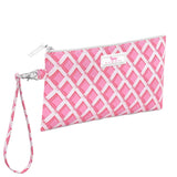 Pink and white patterned wristlet with a strap on a light white background. Available at Be Charmed
