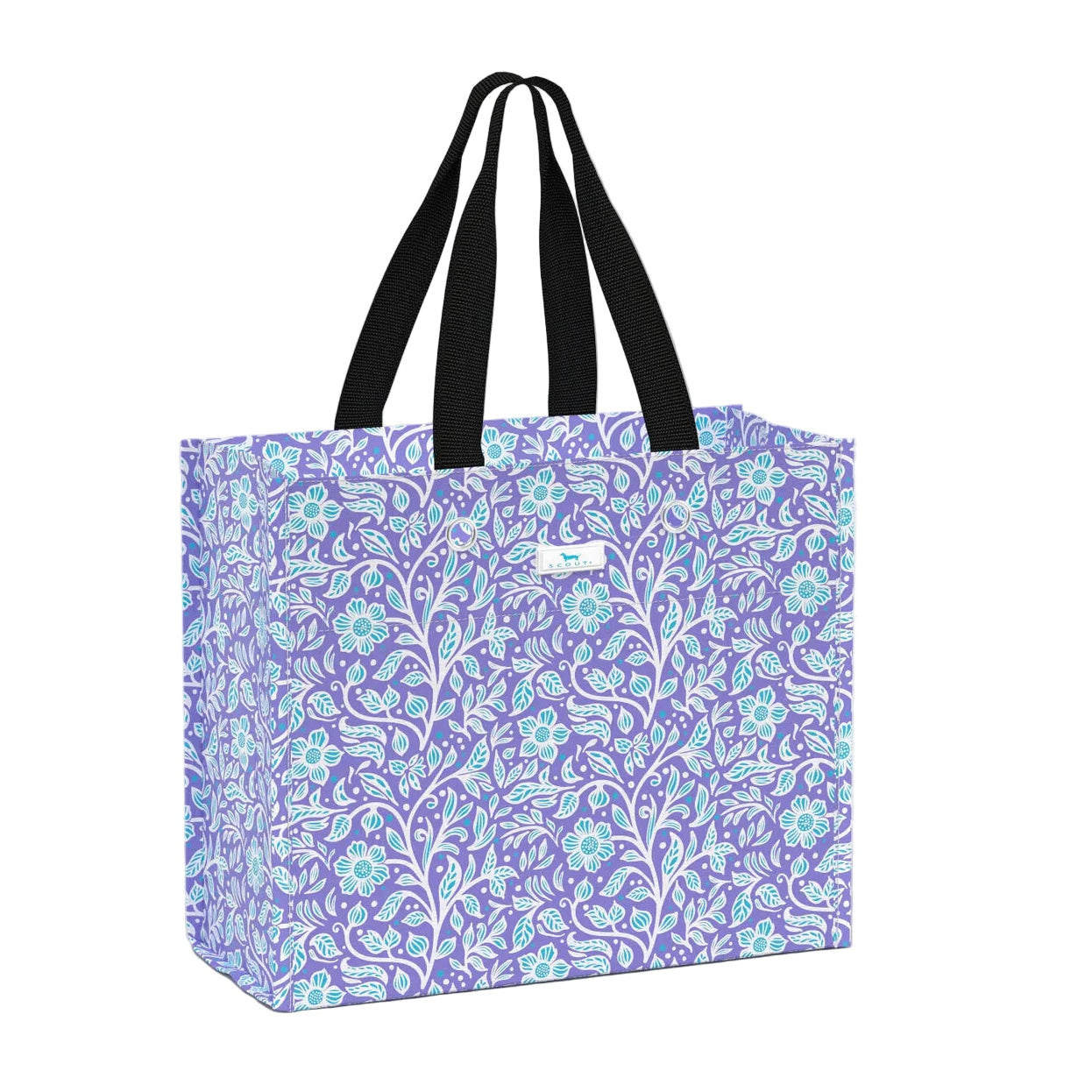 Floral-patterned tote bag with black handles on a white background. Available at Be Charmed