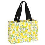 Lemoncello SCOUT Tiny Package Gift Bag – 11"W × 8"H × 4.5"D all‑weather woven bag folds flat, weighs 0.2 lbs, holds 30 lbs, reusable and wipe‑clean. Available at Be Charmed